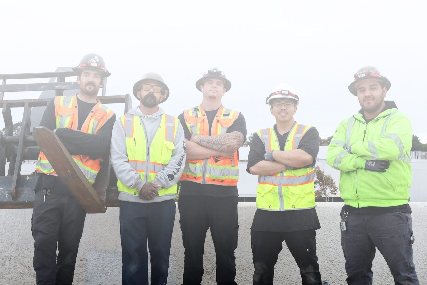 Elson Electric low voltage team (mobile) Elson Electric low voltage crew in hi-vis vests at a job site