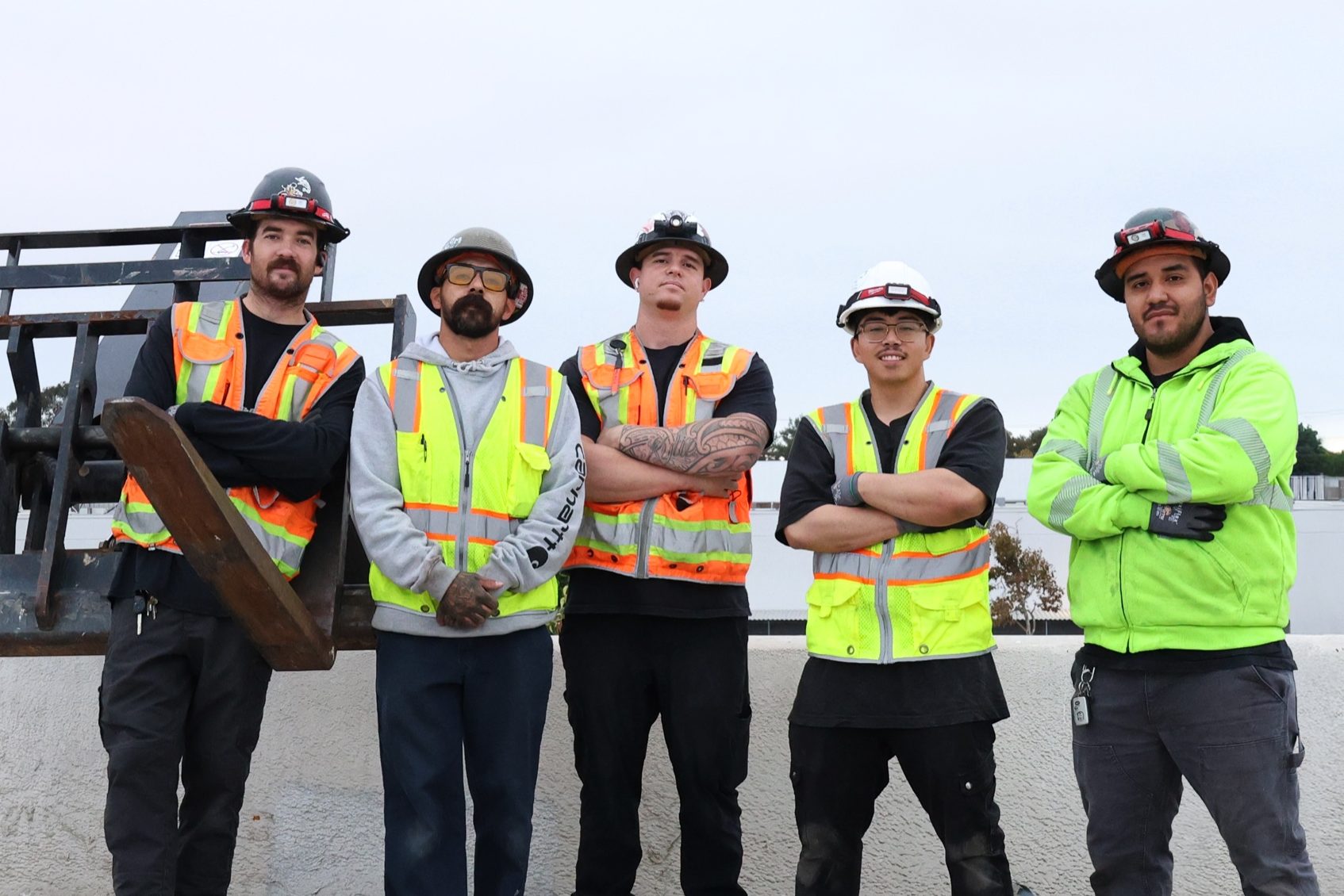 Elson Electric low voltage team Elson Electric low voltage crew in hi-vis vests at a job site